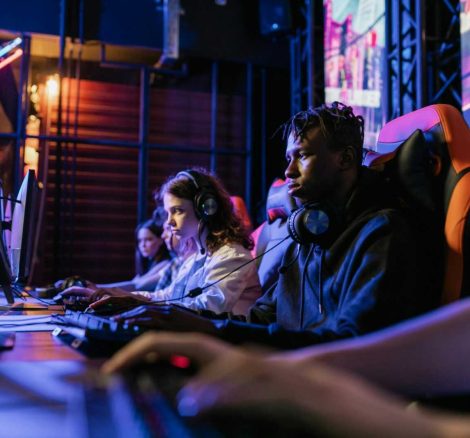 Serious gamers engage in a competitive esports event, highlighting focus and teamwork.